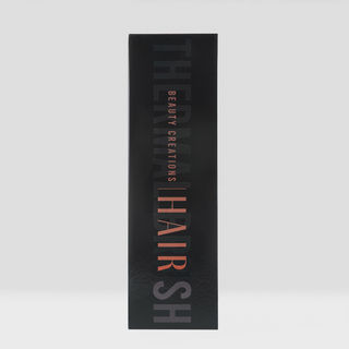 Black hairbrush packaging with 'THERMAL HAIR SH' text on a white background
