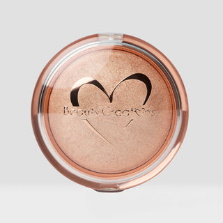 Makeup compact with 'Beauty Creations' logo on a light gray background. Shade is Moonlace body and face highlighter.