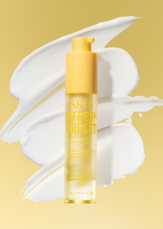 A bottle of Skin Refresh Reset eye cream centered against a pale yellow background with a white cream smear behind it.